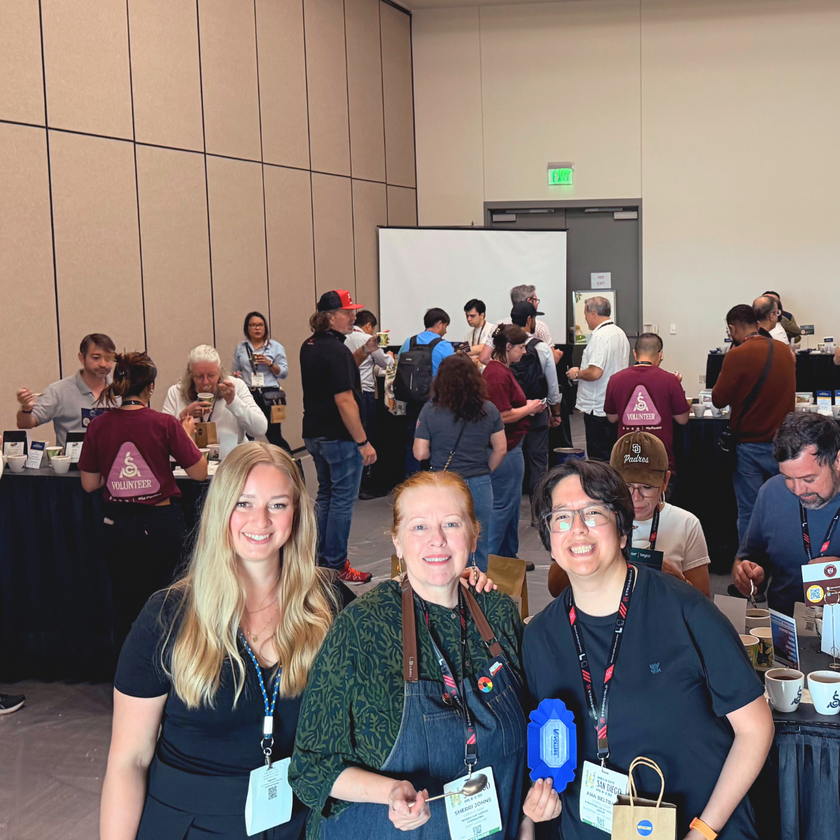 Participants and organizers gathered during the V-Auction Selects cupping at World of Coffee San Diego.