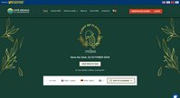 Hidden Beans Auction webpage showing a green background, a lightbulb made of coffee cherries, and navigation elements.